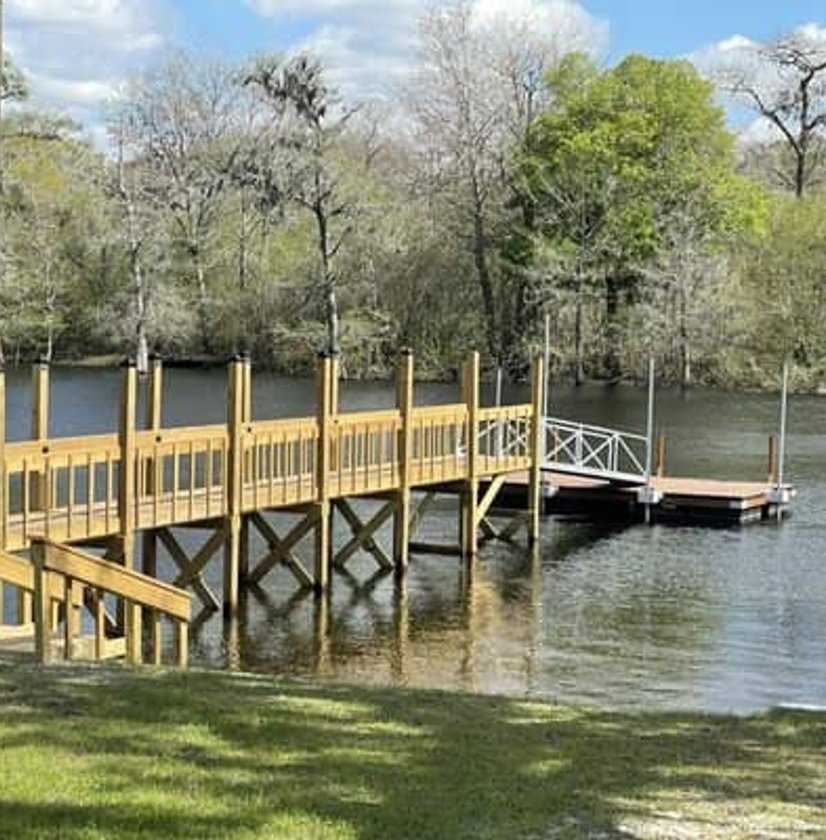 Boat lift and dock on residential waterfront