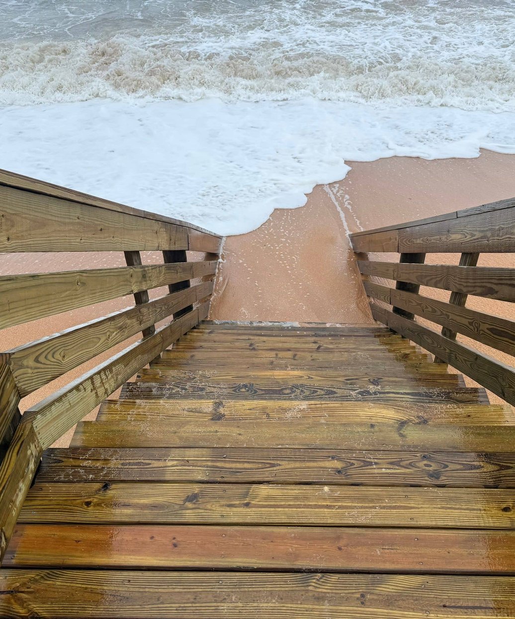 Marina dock with boats and covered slips